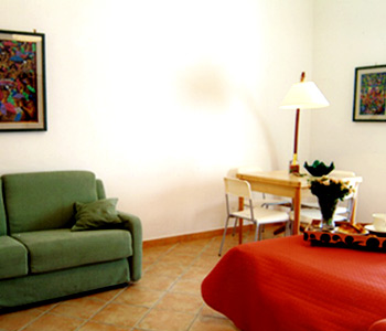 Camera doppia con salotto