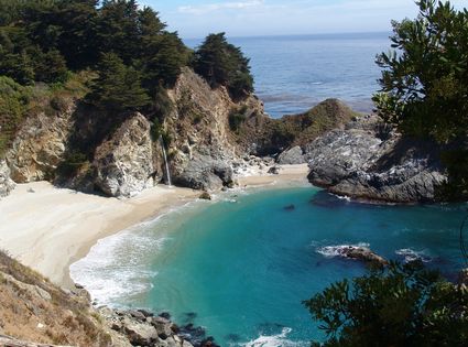 carmel waterfall on a beach at the pacific ocean