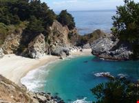carmel waterfall on a beach at the pacific ocean