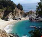 carmel waterfall on a beach at the pacific ocean carmel waterfall on a beach at the pacific ocean