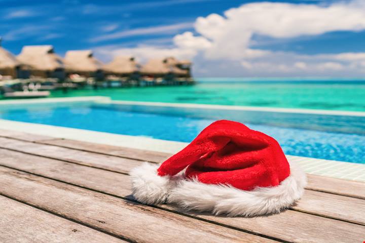 Già stanco del freddo? Ecco 4 località meravigliose dove organizzare il tuo Natale 2024 ai tropici e sotto il sole
