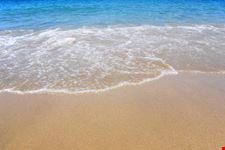 mykonos golden beach background