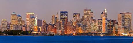 new york manhattan lower skyline with statue of liberty