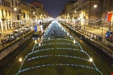 naviglio grande lit up at night milan